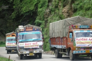 series of three trucks